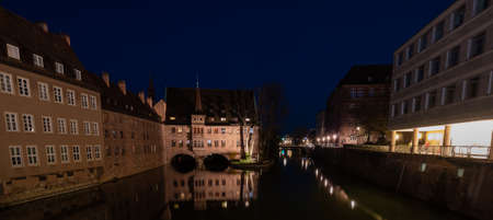 River in the city with lightsの写真素材