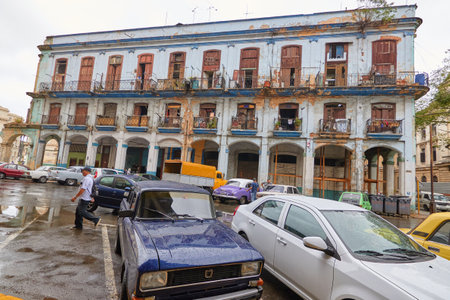 Close-up of a classic American car in Cuba with buildings in the backgroundのeditorial素材