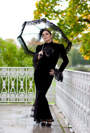 beautiful aristocratic woman near palace