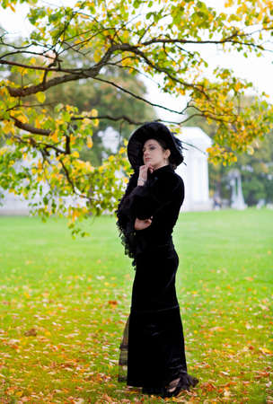 beautiful aristocratic woman near palaceの写真素材