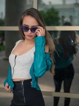 walk with a beautiful girl around townの写真素材