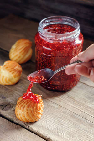 Grandma's Delicious raspberry jam in the summer at the cottage.の写真素材