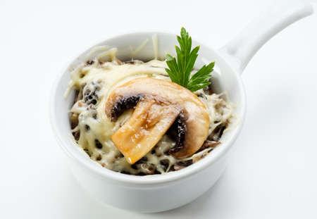 Delicious dishes from the restaurant menu on a white bowl on a white background.の写真素材