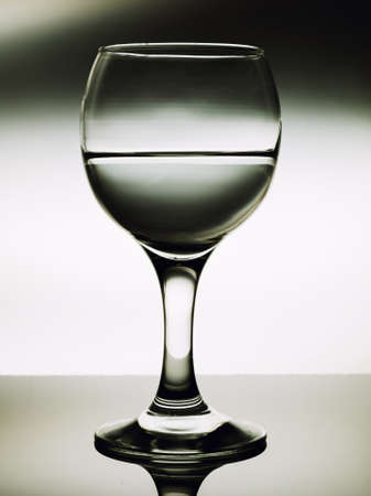 Promotional photos colored wine glasses colored lights on a gleam of light.の写真素材