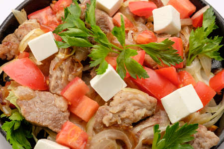 The dish is cooked in a pan professional chef in a restaurant on a white background.の写真素材