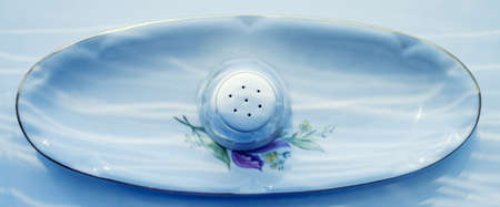 Beautiful blue tableware From the top is illuminated with light from the window.