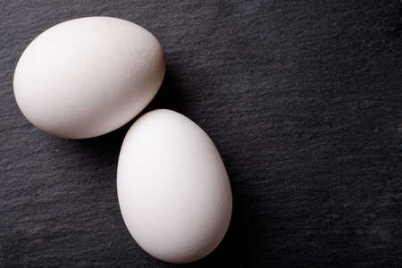 Eggs on black blackboard
