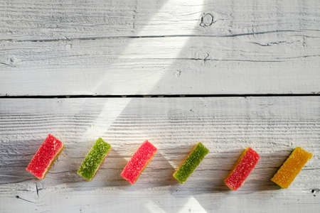 Colorful delicious marmalade on wooden boardsの写真素材