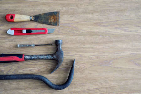 Close up tools on a wooden background