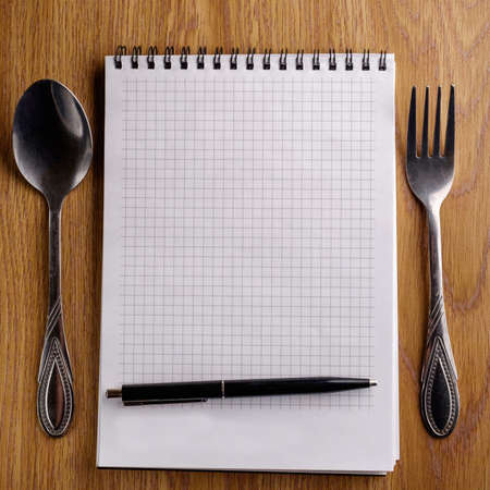 Pen and Notepad on the wooden desk. Pen and Notepad on the wooden deskの写真素材