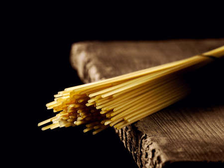Lots of spaghetti isolated on black backgroundの写真素材