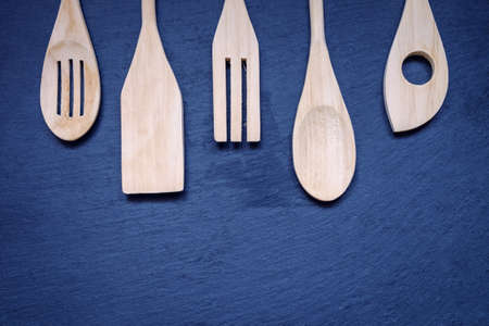 Kitchen utensils on the background of slate boards.の写真素材