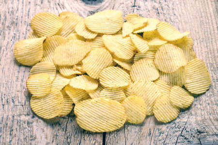 Delicious beautiful chips are removed with the light from the window.の写真素材