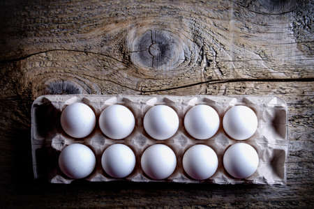 close up of eggs in cardboard container