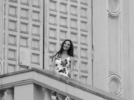 Outdoors portrait of beautiful young brunette girl.