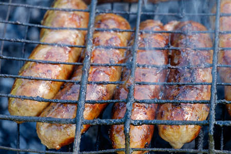 Delicious sausages made of natural meat. Prepared in the lattice in the fire.の写真素材
