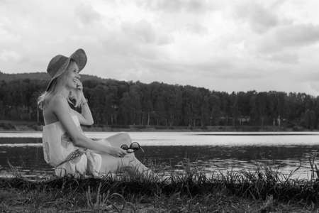 Outdoors portrait of beautiful young brunette girl.の写真素材