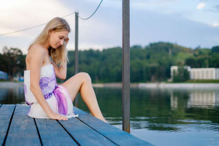 Outdoors portrait of beautiful young brunette girl.の写真素材