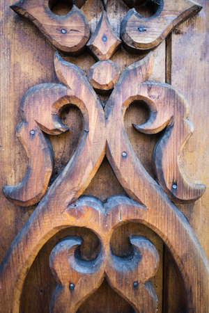 Pattern of wood frame carve flower on wood backgroundの写真素材