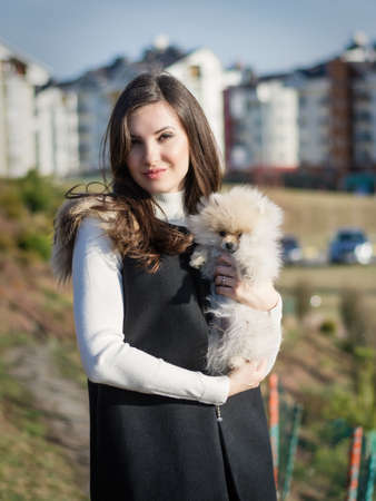 Image of young girl with her dogの写真素材