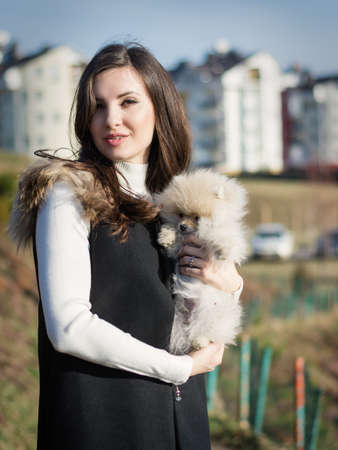 Image of young girl with her dogの写真素材