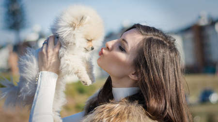 Image of young girl with her dogの写真素材