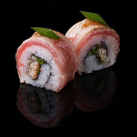 Sushi served on a black background with reflection.の写真素材