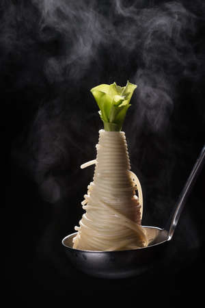 Spaghetti on a black backgroundの写真素材