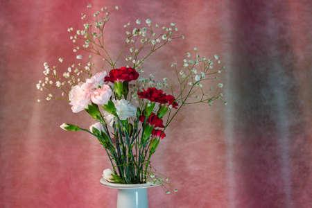 Bouquet of carnations. Concept for Valentines Day or Womens Day or Mothers Day.の写真素材