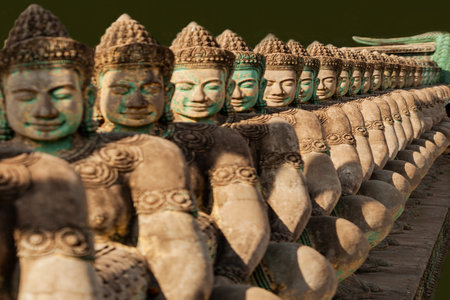 Buddha statues at the entrance to the temple in Thailand.の写真素材