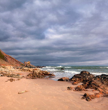 Seascape with stormy clouds over the sea. Toned.の写真素材