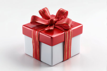 gift box with red ribbon isolated on white background, clipping path includedの素材