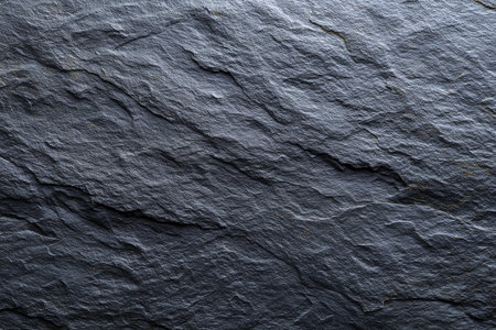 Dark grey slate background or texture. Abstract dark grey stone surface.の素材