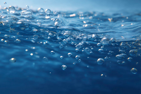 Underwater background with air bubbles. Close up of water surface.の素材