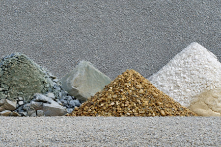 Various types of gravel and stones on the ground. Abstract background.の素材