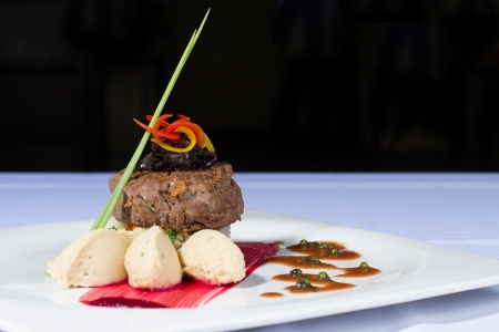 beef tenderloin steak with mashed potatoes, pepper sauce and beetroot sauceの写真素材