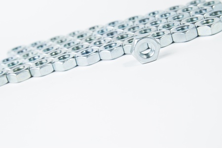 chrome nuts solated on white backgroundの写真素材