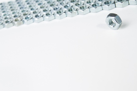 chrome nuts solated on white backgroundの写真素材