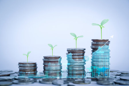 Row of coins for business background, money savings and accounts, bank finance. business concept idea, investments, funds, dividends, financial transactions, trees growing on coins, business growth.の写真素材