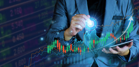 Businessman planning to invest in stock market. man touching success goals icon on virtual screen, stock graph is rising, economy is recovering, stock trading, bussiness start up, business success.の写真素材