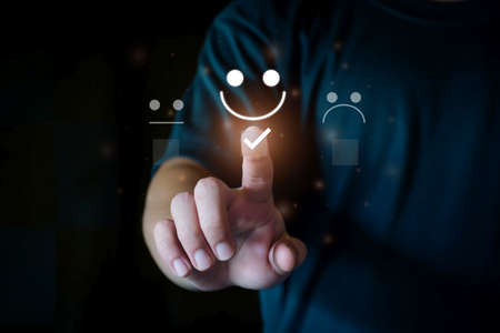 Customer satisfaction survey. Customer Satisfaction Rating, Smiley Emoji, Happy Customer, Good Service, Positive Rating, Happy Service, Five Star Service. Virtual touch screen, futuristic technology.の写真素材