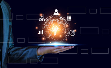 Businessman conducting online transactions with internet technology. Concept global data connection by metaverse technology , big data , search for information, e-commerce, online business.On tablet.の写真素材