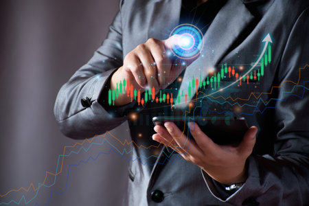 Businessman planning to invest in stock market. man touching success goals icon on virtual screen, stock graph is rising, economy is recovering, stock trading, bussiness start up, business success.の写真素材
