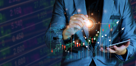 Businessman planning to invest in stock market. man touching success goals icon on virtual screen, stock graph is rising, economy is recovering, stock trading, bussiness start up, business success.の写真素材