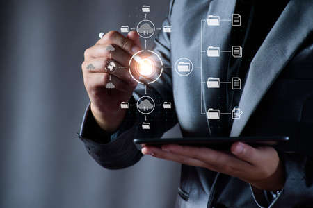 Digital file management concept. Businessman are accessing big data storage on Internet, Digital Storage, Cyber ââSecurity, Global Data Links, Digital Business, Files data, Internet of things.の写真素材