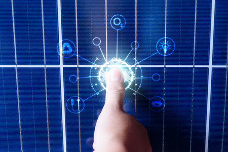 energy saving concept Protect the environment. people finger touching solar panels, clean energy, CO2 reduction, renewable energy, solar power generation, global warming reduction, blue solar panelsの写真素材