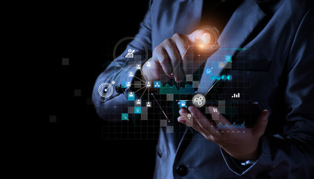 Business man using tablet on global network connection on investor and customer with sale data exchange and development of business. Technology and digital marketing. Financial and banking.の写真素材