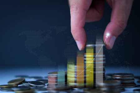 Business man putting coins Business growth and investment chart, strategic planning to increase profits from doing business, long-term investment planning, save money for future investment.の写真素材