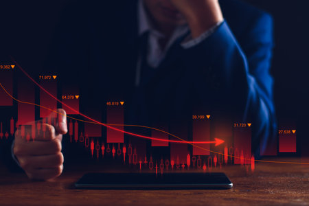Property values are steadily declining. Unhappy businessman, business downturn. company stocks fall in value, economic crisis, global economy slows down, trading drops, high risk investments.の写真素材