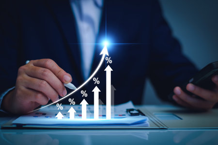 Interest rate and dividend concept. Businessman with percentage symbol and up arrow, Interest rates continue to increase, return on stocks and mutual funds, long term investment for retirement.の写真素材